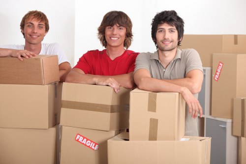 Local removal team handling boxes and furniture in Elephant and Castle